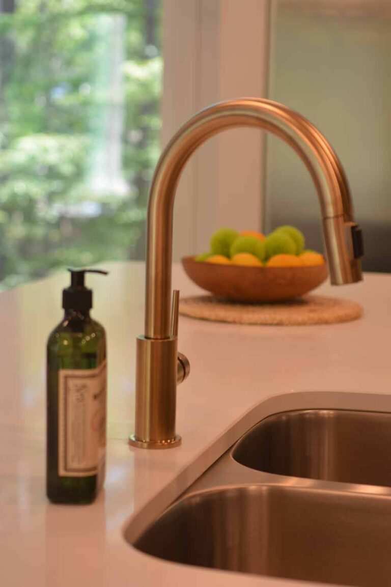 Close-up of a kitchen sink with soft lighting done by MSS Ortiz electricians